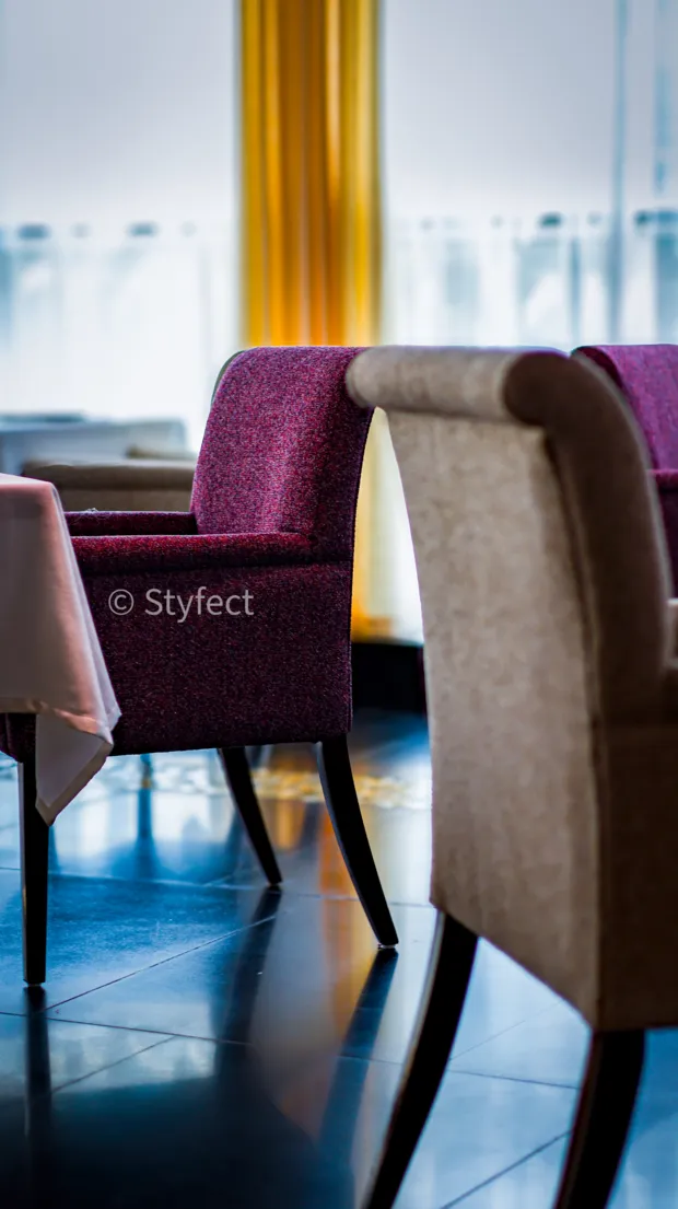 Upholstered dining chairs at Indish Restaurant