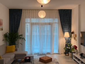 Custom living-room curtains with white sheers installed by StyFect Curtains & Blinds in Dubai