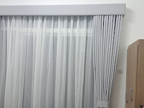 Sheer and pinch-pleat curtains supplied by StyFect Curtains & Blinds Dubai