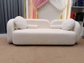 Boucle sofa and curtain display inside the StyFect showroom
